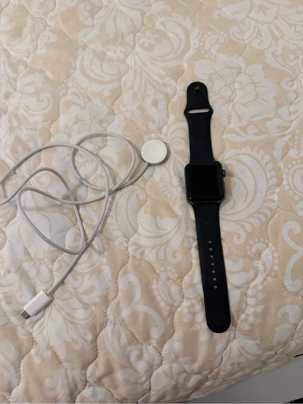 Apple Watch with black Silicone Band and Magnetic Charger. Used